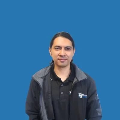 Man in jacket on blue