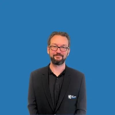 Man in suit with glasses