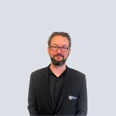 Man in suit and glasses