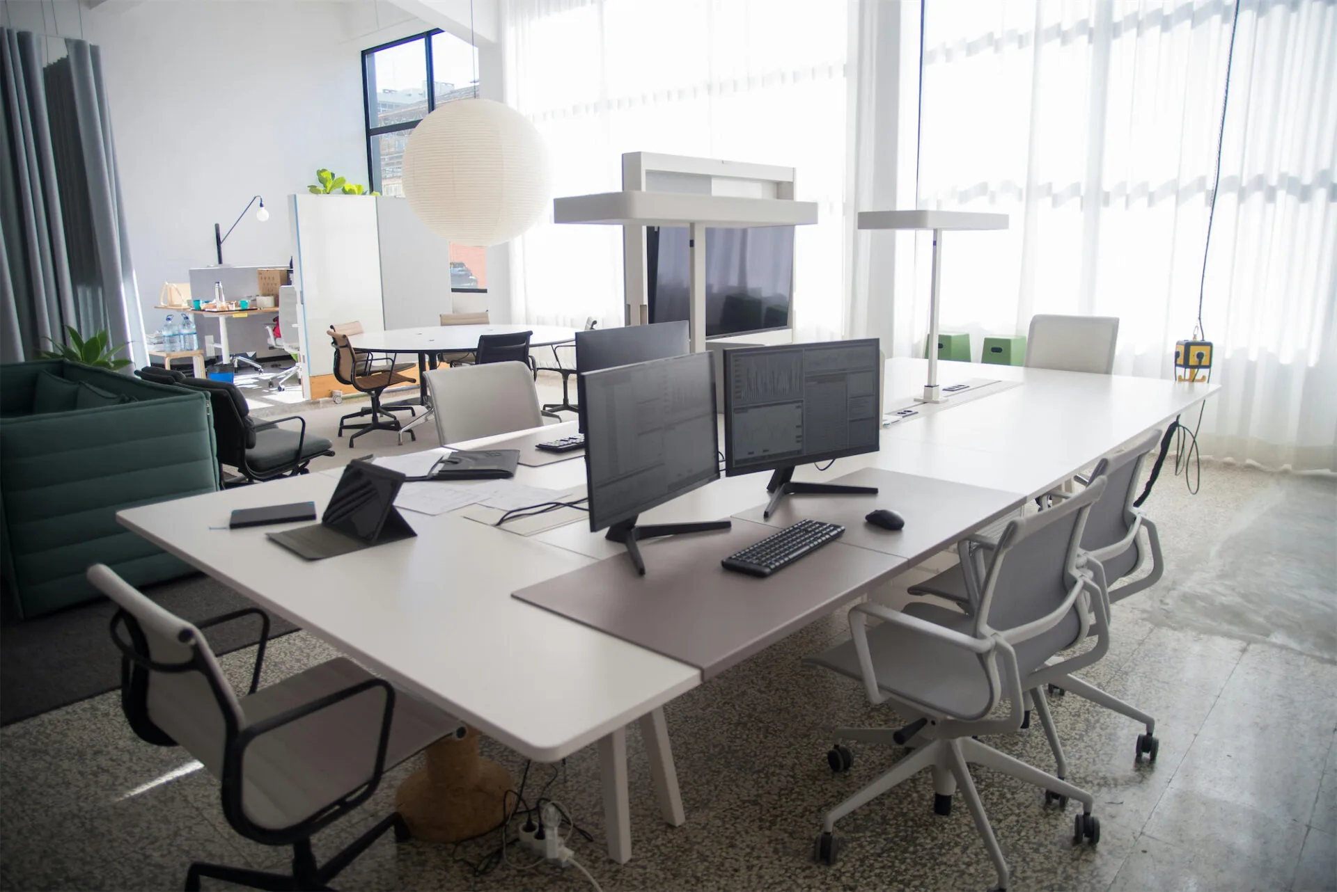 Office workstations with desktop computers and monitors