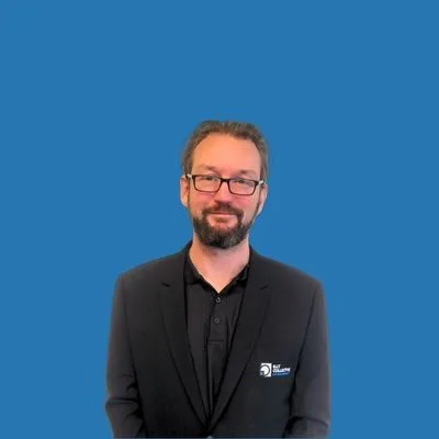 Man in suit with glasses