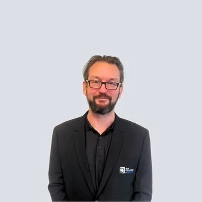 Man in suit and glasses